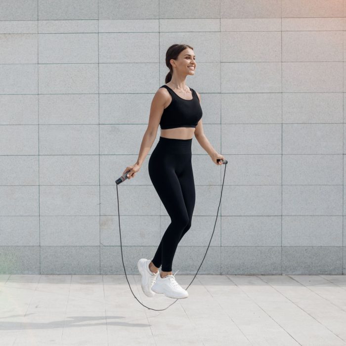 young-woman-doing-fitness-outdoor